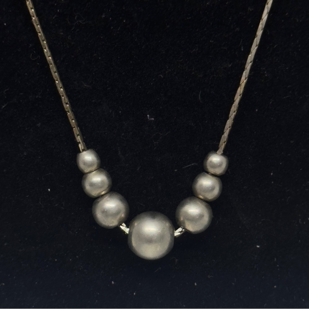 Elegant Silver Beaded Necklace